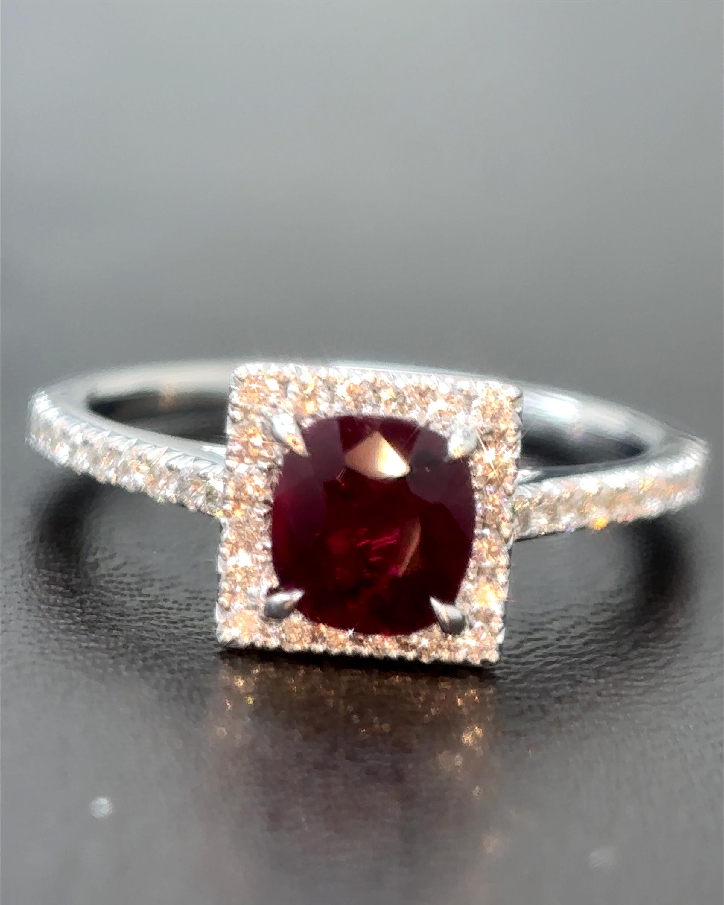 A beautiful creation, it features a rare 0.89 carat Burmese natural ruby, spared of any treatment whatsoever, surrounded by high quality natural white mixed cut diamonds.

Certified by Gubelin Gem Lab, the ruby is fashioned as a cushion-cut, hailing