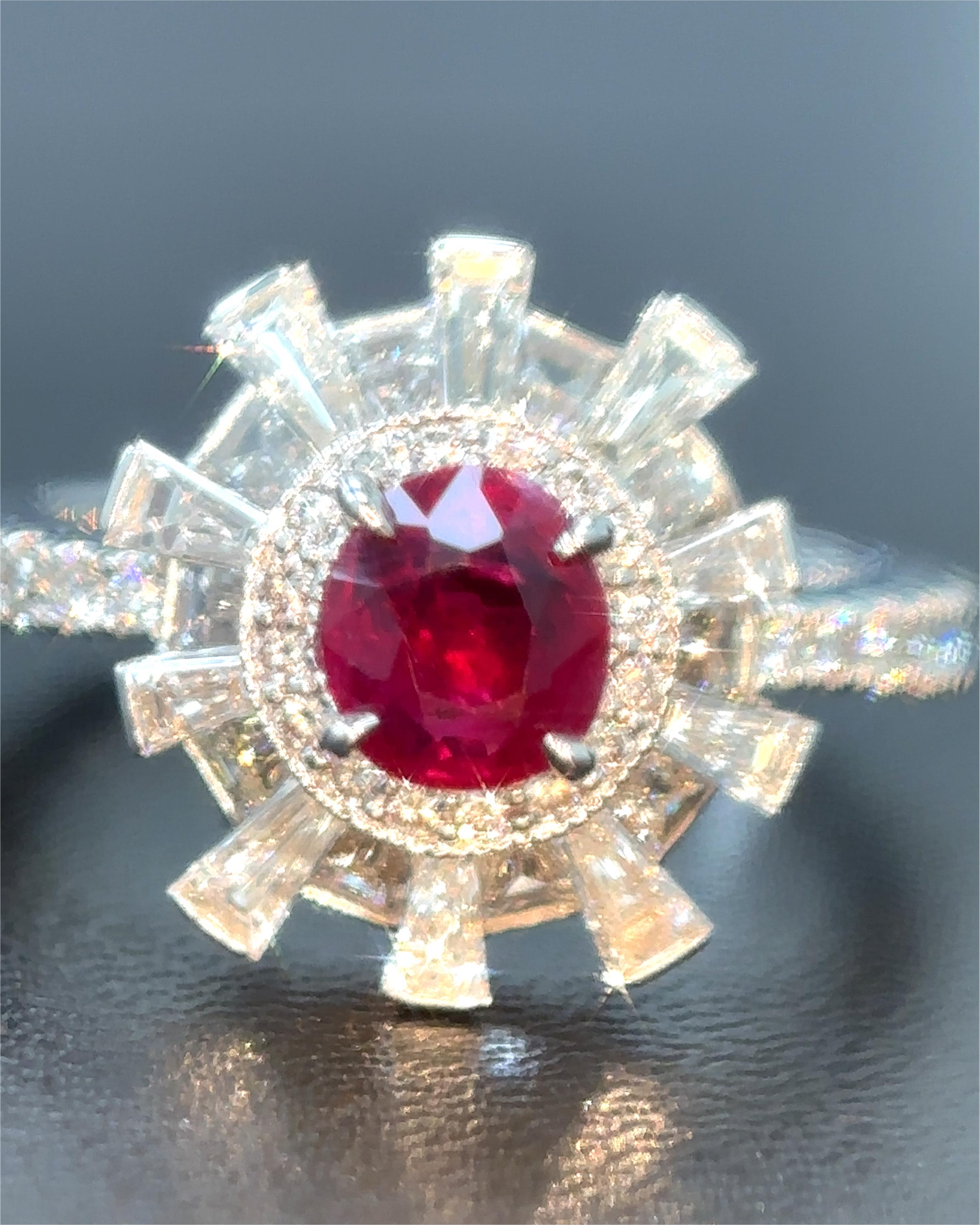 A beautiful creation, it features a rare 0.93 carat Burmese natural ruby, spared of any treatment whatsoever, surrounded by high quality natural white mixed cut diamonds.

Certified by Gubelin Gem Lab, the ruby is fashioned as a cushion-cut, hailing