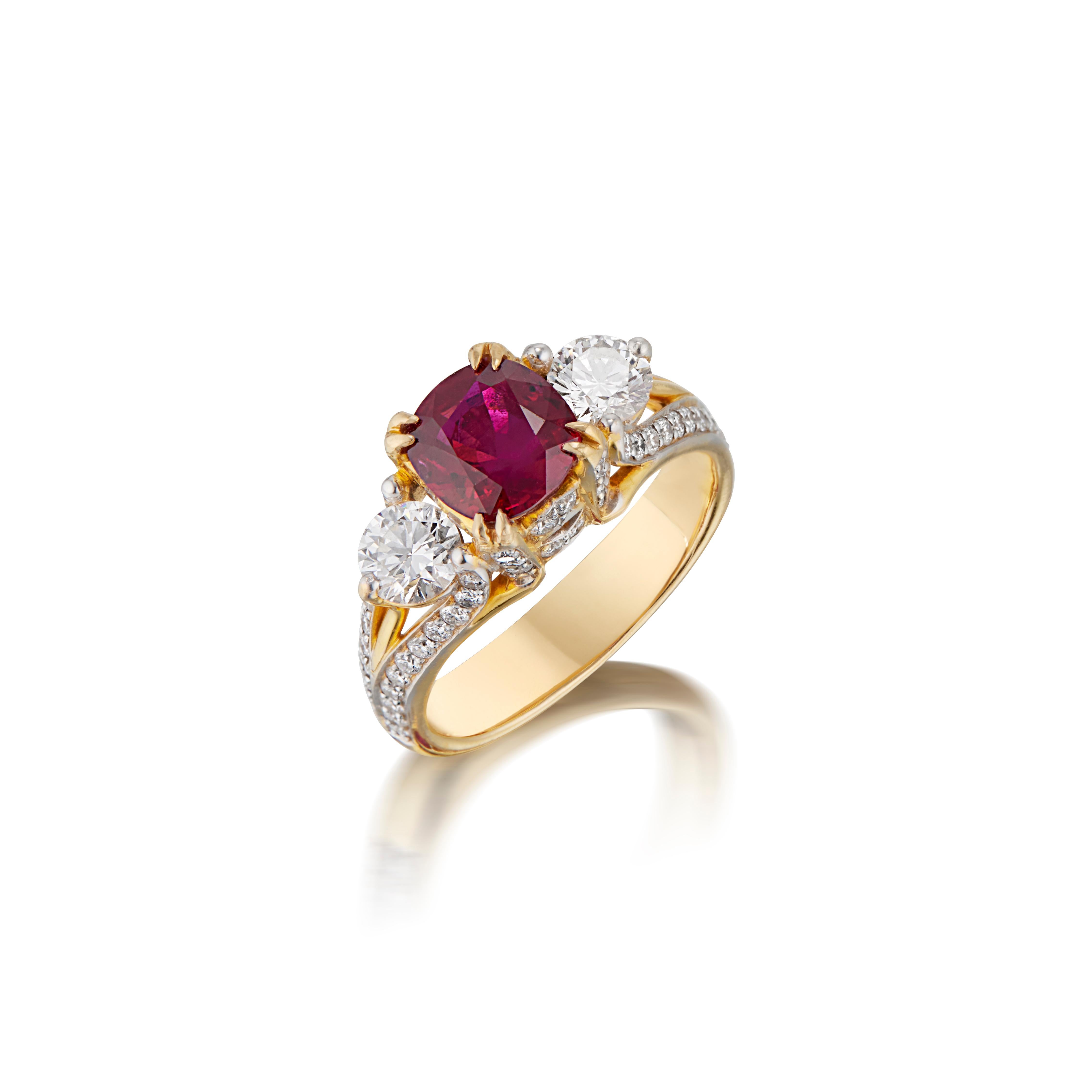 18K YELLOW GOLD 
68 DIAMONDS, 0.61CARATS
2 IF, D COLOR GIA CERTIFIED DIAMONDS, 0.74 CARATS
1 NO-HEAT PIGEON BLOOD BURMESE RUBY, 1.74 CARATS
GUBELIN LAB CERTIFIED, PIGEON BLOOD RED

Introducing our exquisite 1.74 carat Burmese Cushion Shaped Ruby