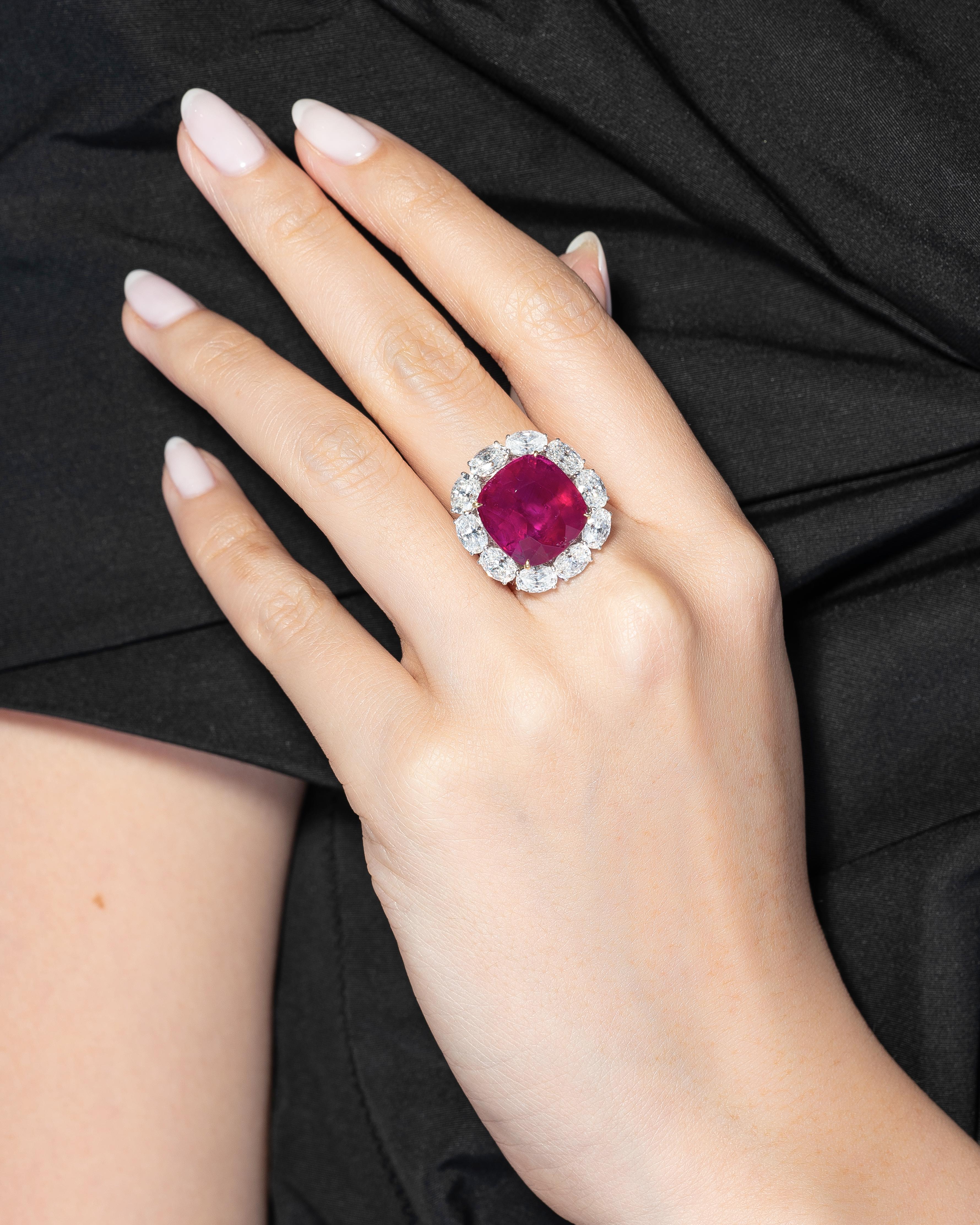 This No-Heat Burmese Ruby ring from Vihari Jewels is an absolute showstopper. The 14.25 carat cushion shaped Burmese No-Heat Ruby has been certified by Gubelin (Certificate #18027046) and makes an impactful statement. The Ruby is surrounded by 7.14