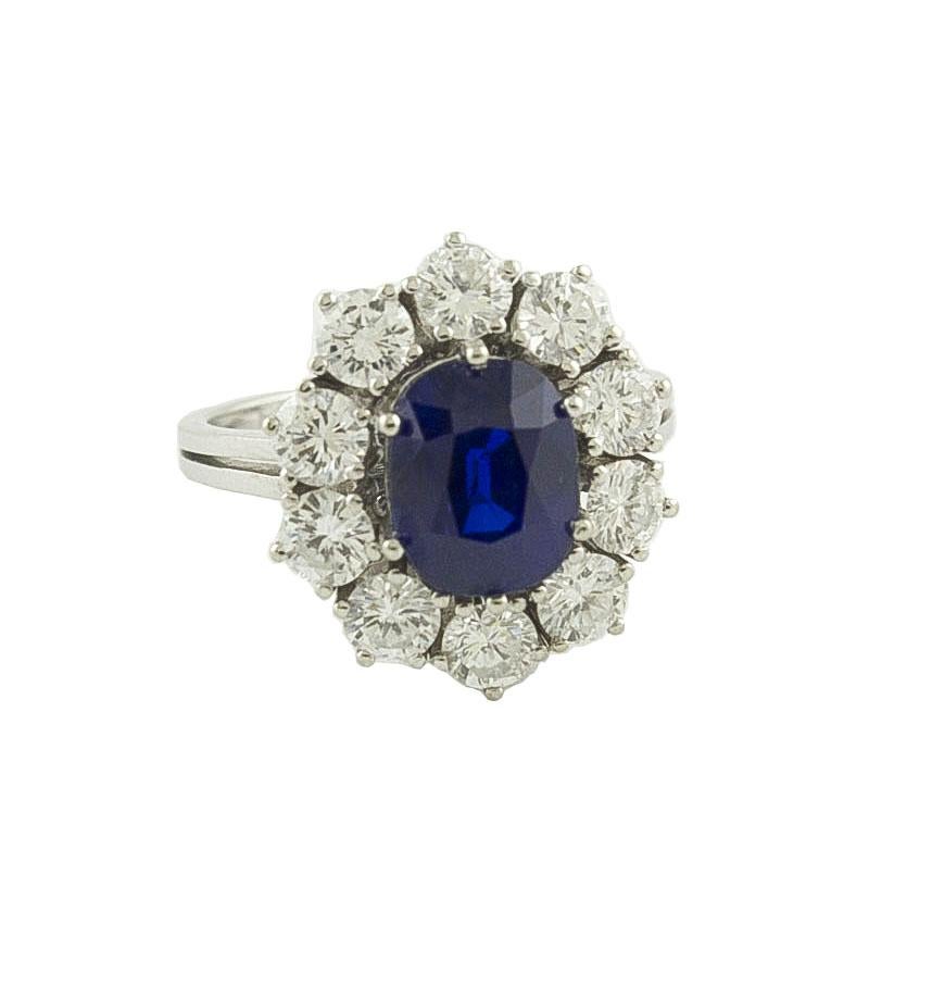 Fabulous 18K white gold ring mounted with a special Kashmir blue sapphire (2.91 ct) in the center and surrounded by white diamonds crown ( 2.00 ct )
Blue Sapphire 2.91 ct    Measurement 8.46 X 6.81 X 5.37     Gubelin certify this Blue sapphire: no