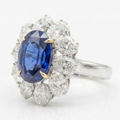 Gübelin Certified 4.68 Carat No Heat Ceylon Blue Sapphire Diamond Halo Ring