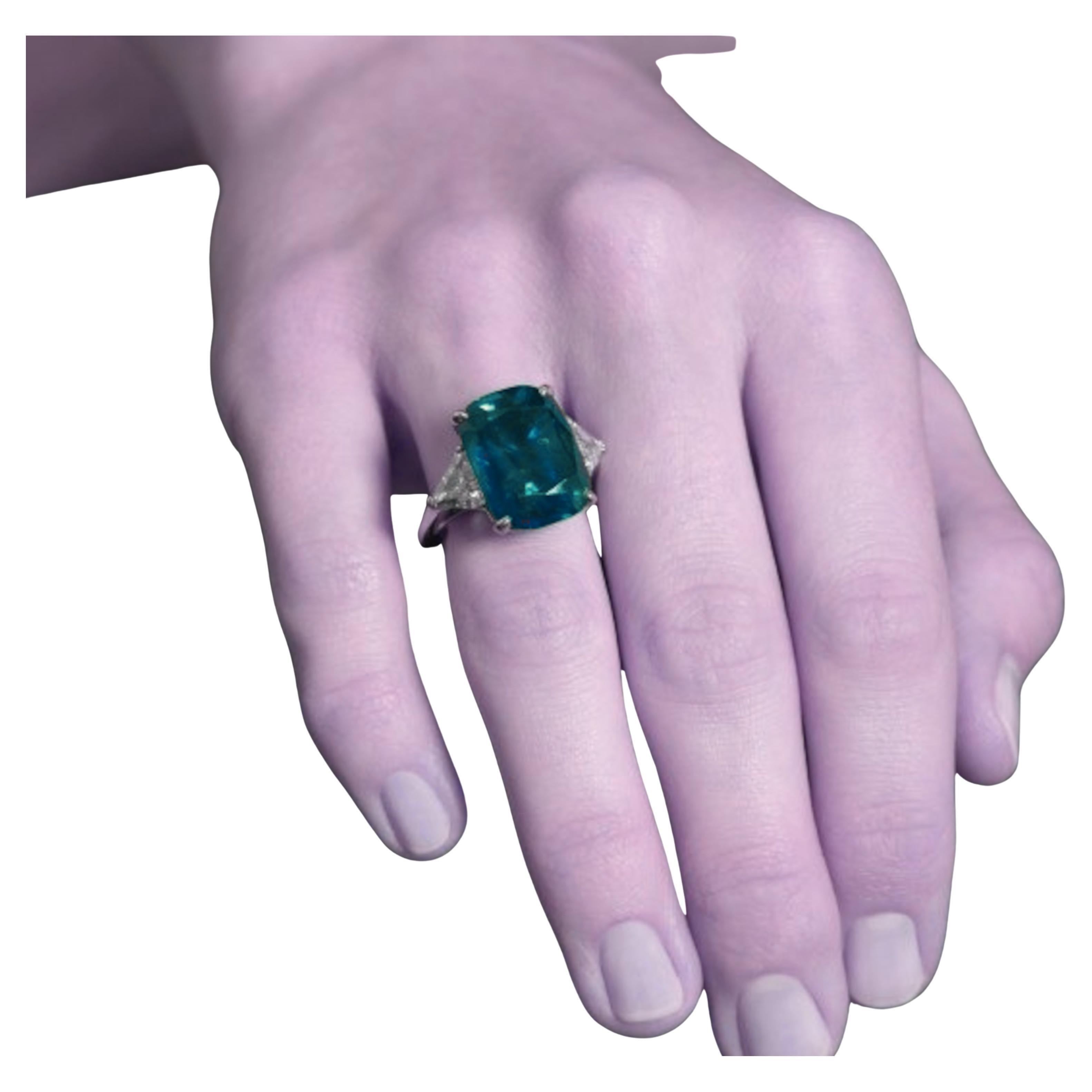  Gubelin Certified 4.82 Carat MINOR OIL Investment Grade Green Emerald Diamond Ring! This exquisite piece features a stunning emerald center stone, elegantly flanked by two shield-shaped diamonds, and enhanced by a trillion-cut diamond gallery and
