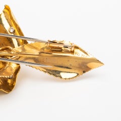 Gübelin Emerald and Diamond Brooch, Designed as a Floral Spray