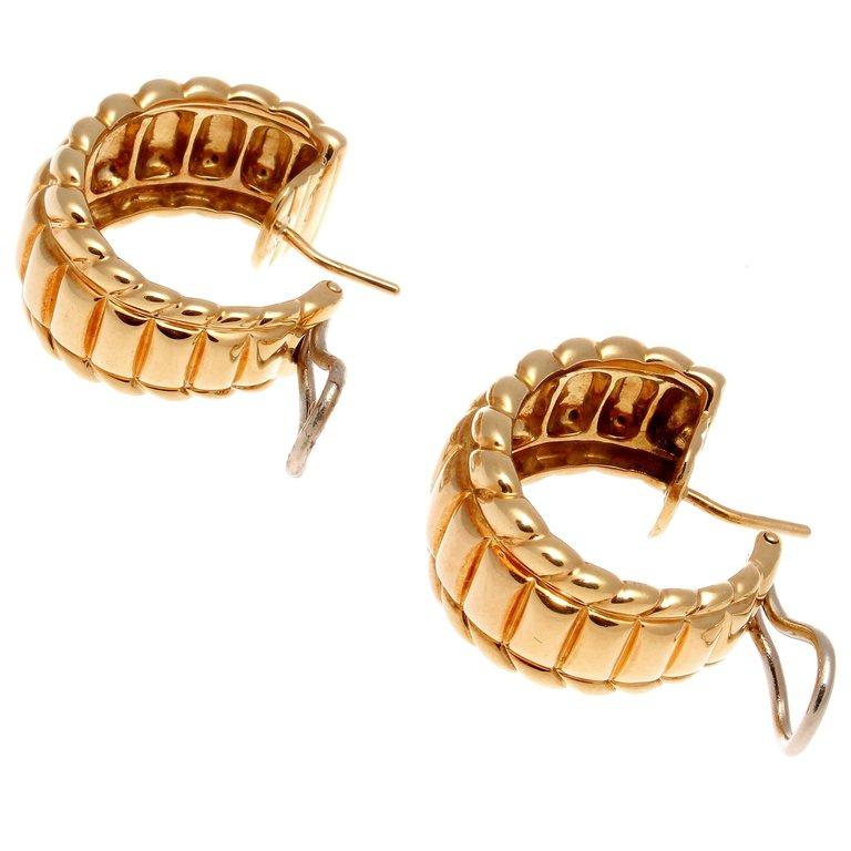 Modern Gubelin Gold Hoop Earrings