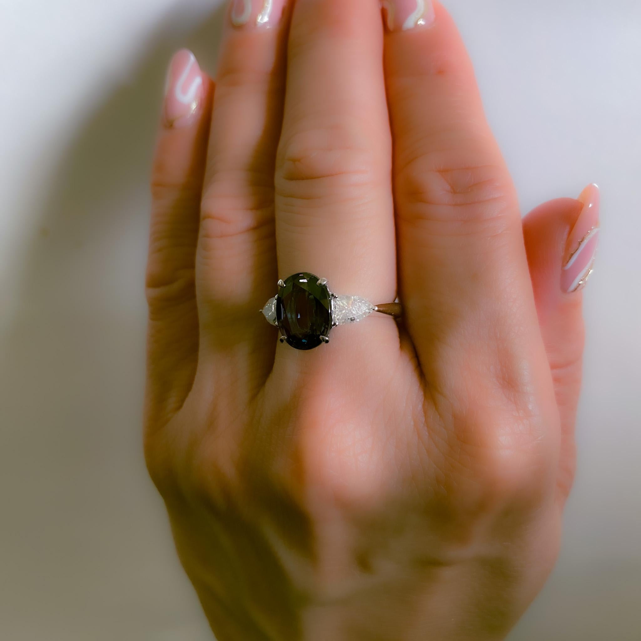 This one-of-a-kind marvel is extremely rare in existence. Alexandrite at sizes greater than 1 carat are rarely found across all geographic sources, to begin with, but 1-carat stones from Brazil are even rarer.  The ring centers a beautiful and fine