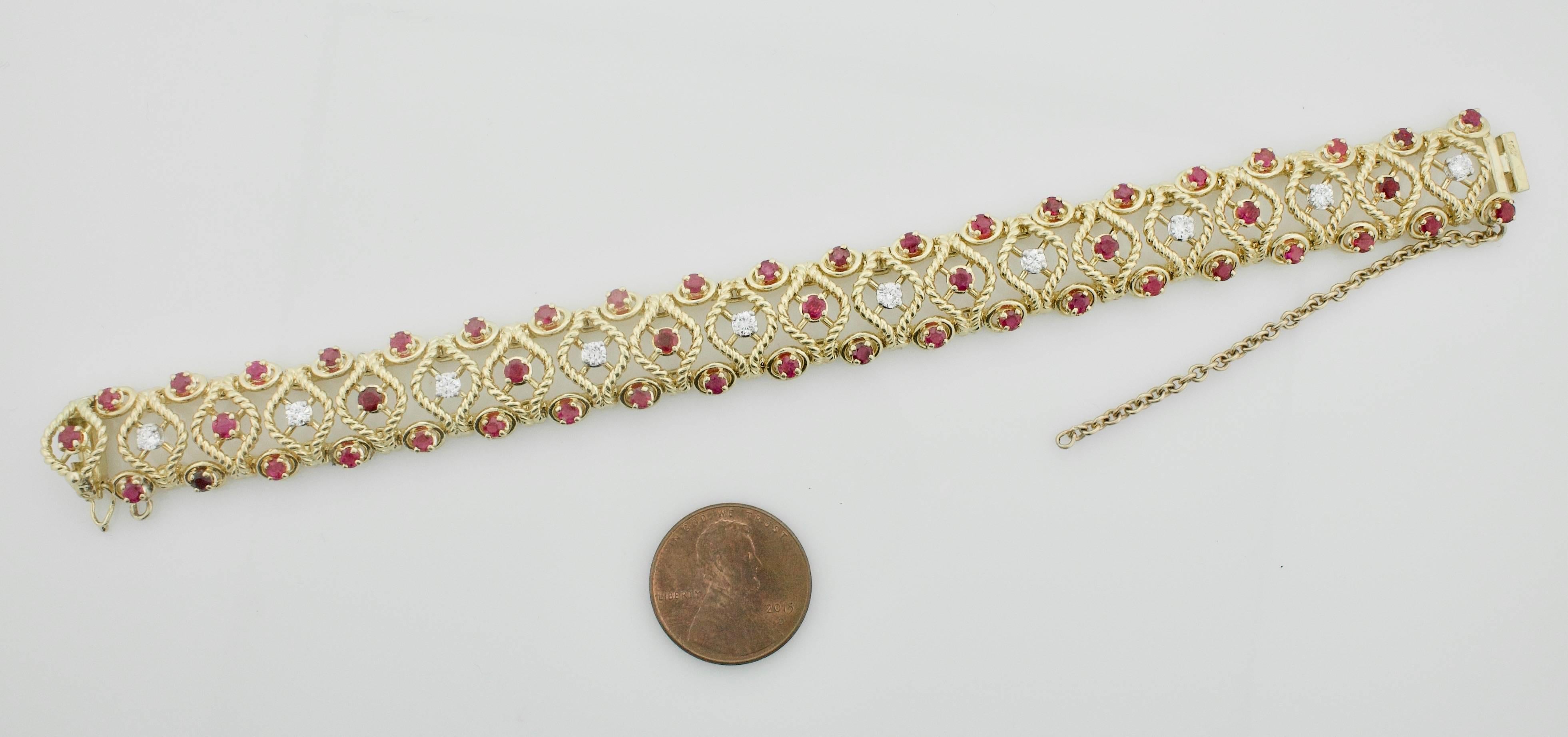 Gubelin Ruby and Diamond Bracelet in 18k Yellow Gold Circa 1950's
Ten Round Brilliant Cut Diamonds weighing .75 carats approximately  GH VVS-VS1 (very fine)
Fifty Round Rubies weighing 4.50 carats approximately Red and VibrantStamped Gublin with