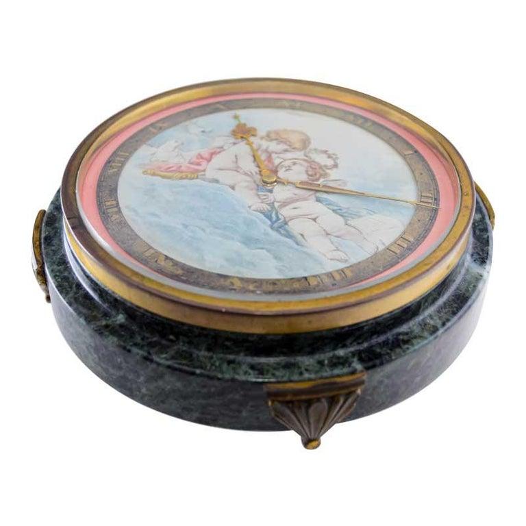 Gubelin Stone and Metal Art Deco Table Clock with Cherubic Hand Made Dial 1930's en vente 3