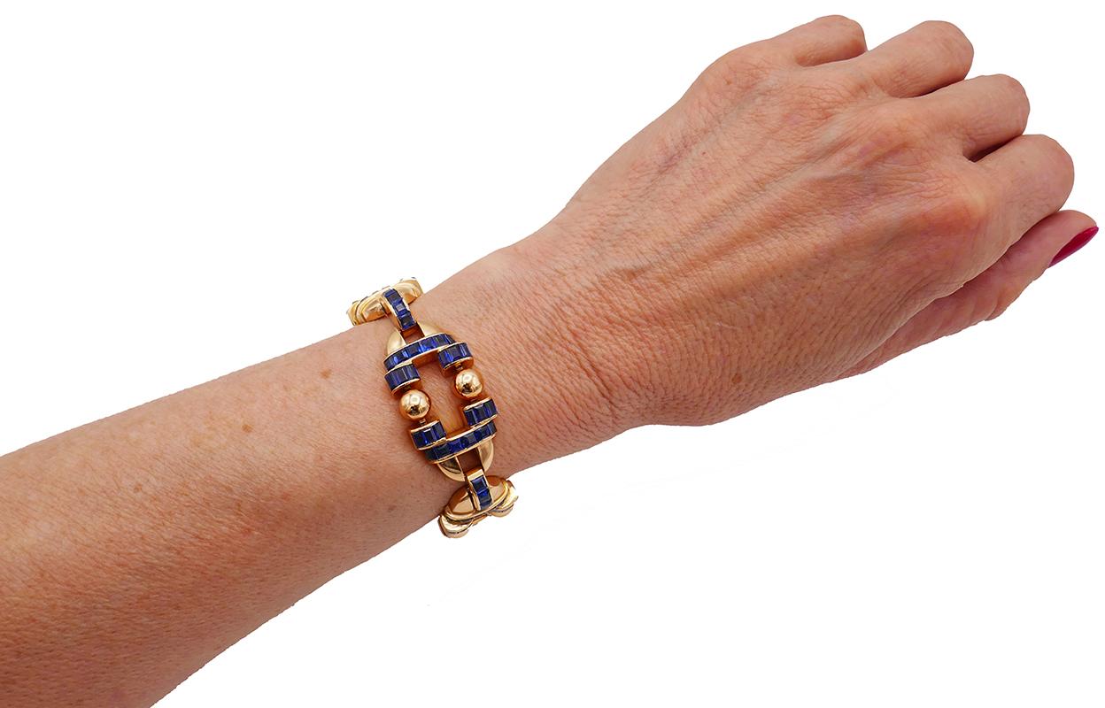 	A stunning Gübelin vintage bracelet in 18k gold featuring sapphire. 

	This extraordinary 18 karat rose gold vintage Gübelin bracelet is composed of the four oval links connected by the hemispheric elements. Each oval link has two symmetrical parts