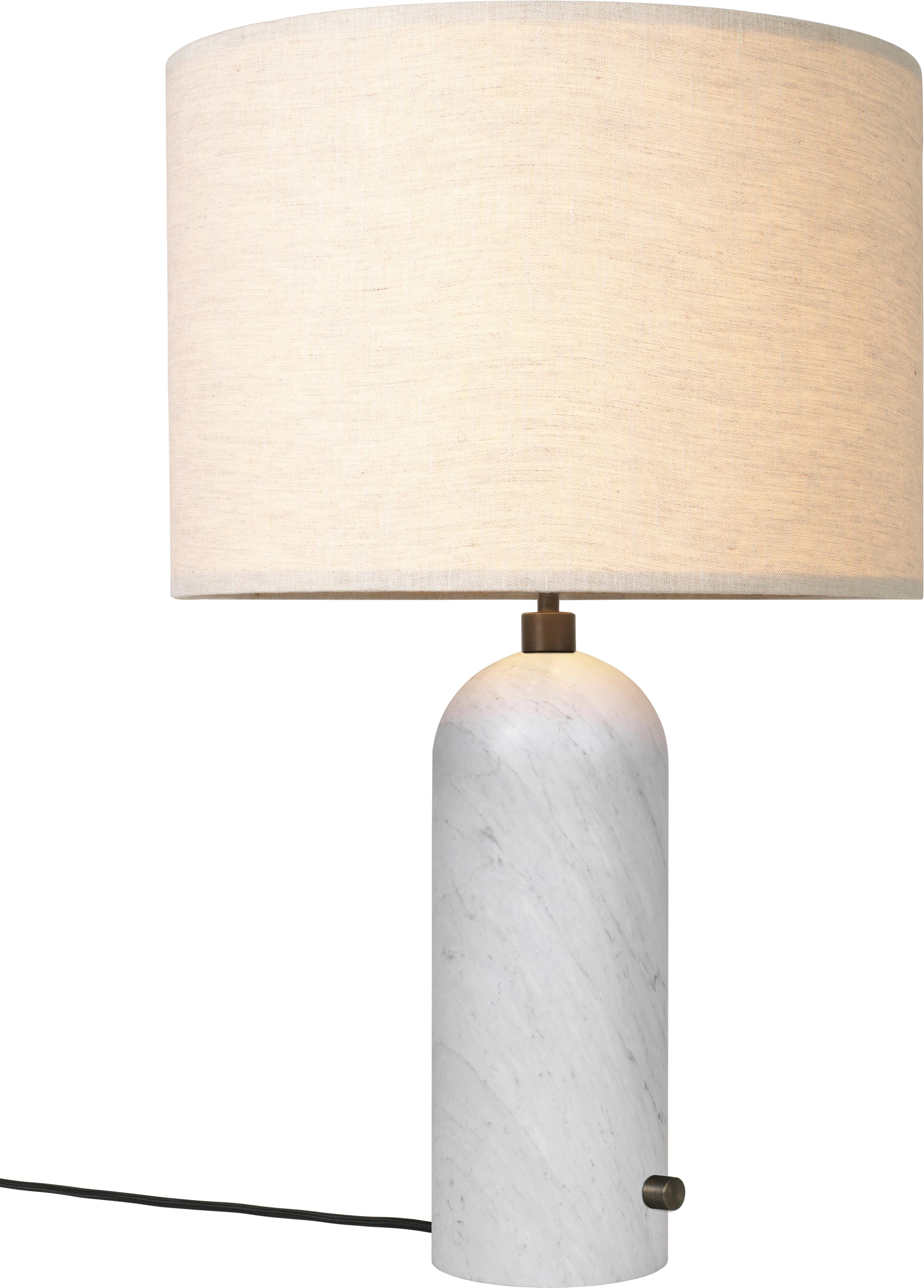 The Gravity Collection designed by Space Copenhagen, consisting of two table lamps, a floor lamp, two pendants and now also two wall lamps is aesthetically contrasting strength and fragility. Taking its name from the lamp’s distinctive balance