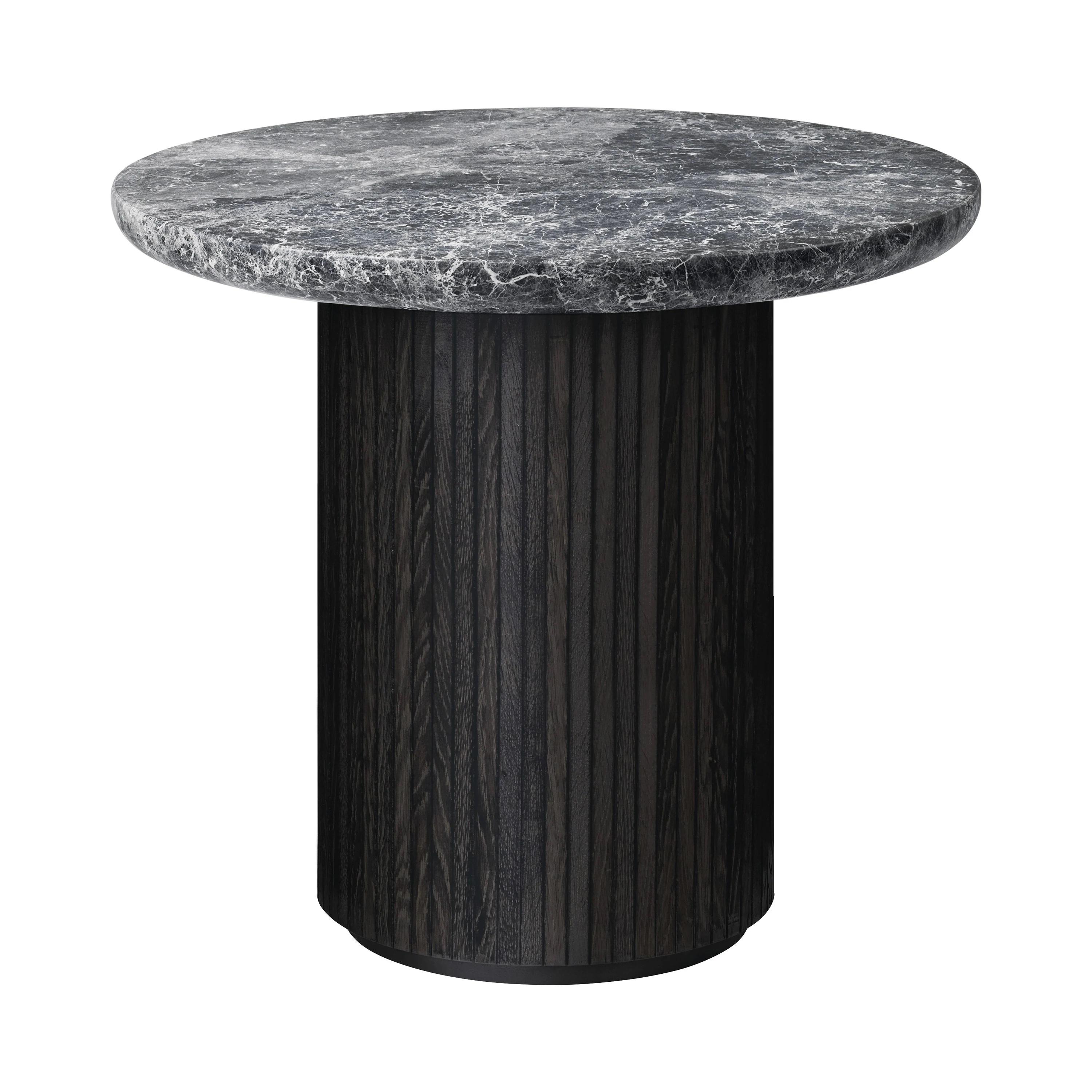Space Copenhagen is the designer behind the classic Moon Dining Table; a series of organic rounded tables for both domestic and public spaces. The interplay between the beautiful solid oak table top and the smooth half – or full moon shaped base,