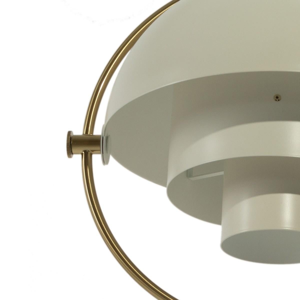 A Gubi Multi-Lite white metal and brass pendant light by Louis Weisdorf, Germany, circa 1970. 

Canopy size: 4.5 inches x 2.3 inches.