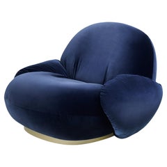 Gubi Pacha Fixed Lounge Chair with armrest by Pierre Paulin