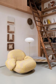 Gubi Pacha Swivel Lounge Chair with armrest by Pierre Paulin