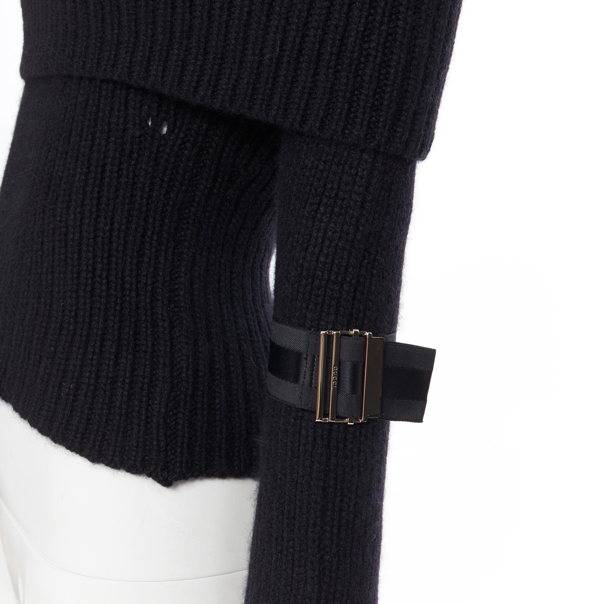 GUCCI 100% cashmere black foldover off shoulder web buckle cuff sweater XS
Brand: Gucci
Model Name / Style: Cashmere sweater
Material: Cashmere
Color: Black
Pattern: Solid
Extra Detail: Signature black striped web with gold tone buckle at cuff.