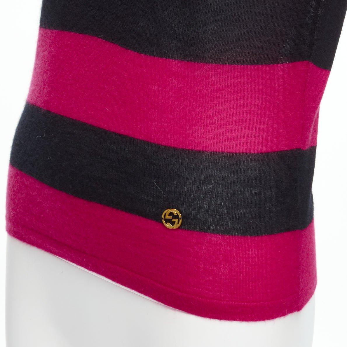 GUCCI 100% cashmere pink black GG charm collar puff sleeve polo shirt IT38 XS
Reference: SNKO/A00240
Brand: Gucci
Material: Cashmere, Cotton
Color: Pink, Black
Pattern: Striped
Closure: Button
Extra Details: Invisible placket. GG gold logo plate on