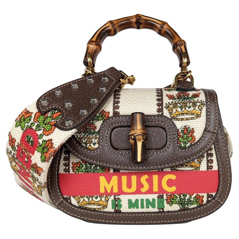 Gucci 100 Convertible Bamboo Top Handle Bag Limited Edition Canvas Mini at  1stDibs | gucci astrology bag, gucci music is mine bag
