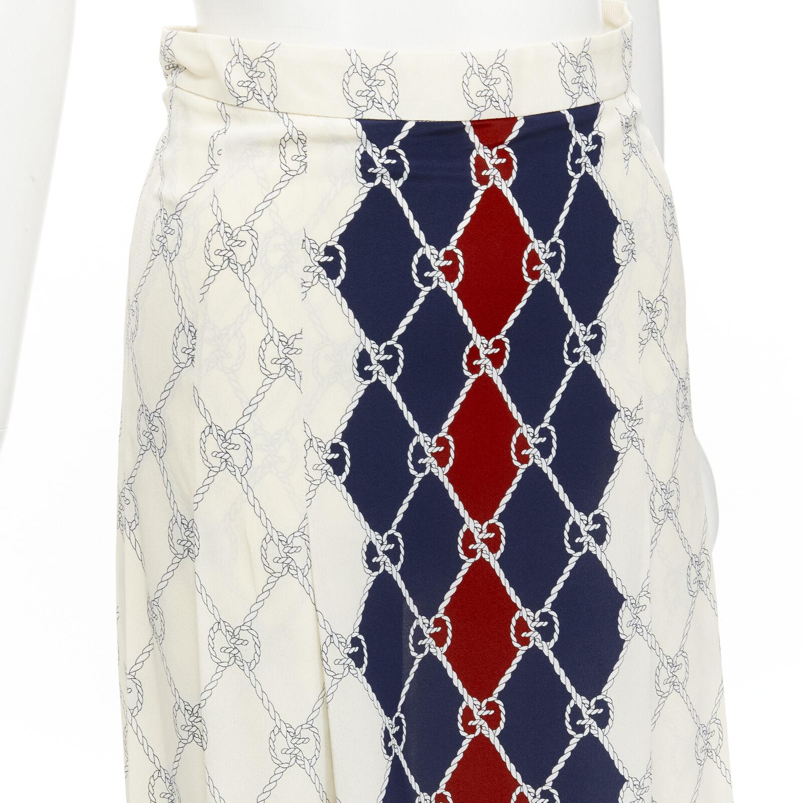 GUCCI 100% silk blue red Rhombus GG Supreme rope monogram pleated skirt IT38 XS
Reference: AAWC/A00391
Brand: Gucci
Designer: Alessandro Michele
Material: 100% Silk
Color: Ecru, Multicolour
Pattern: Monogram
Closure: Zip
Made in: