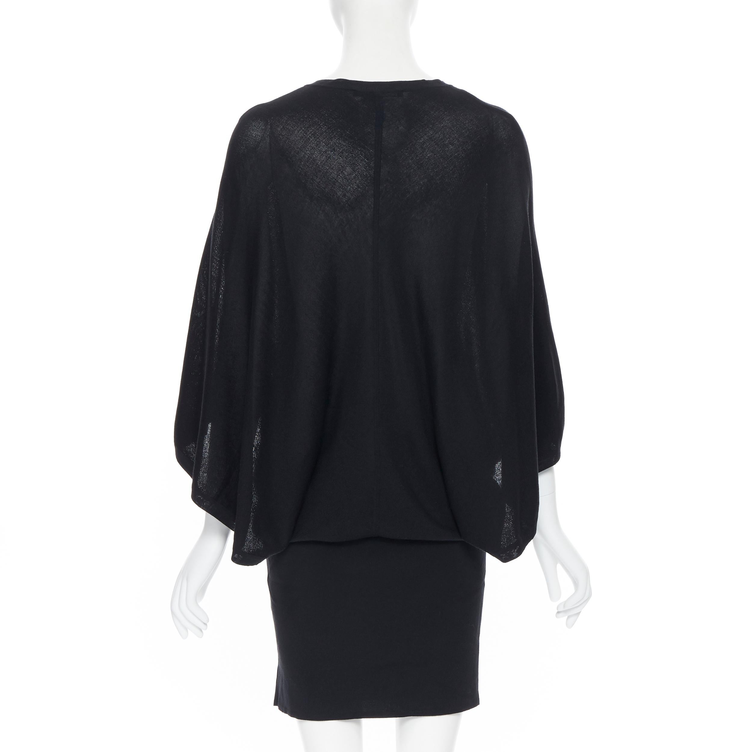 GUCCI 100% silk knitted kyehole front kimono batwing cape sleeve draped dress M
Brand: Gucci
Model Name / Style: Silk dress
Material: Silk
Color: Black
Pattern: Solid
Closure: Button
Extra Detail: Concealed button front. GG logo at waist.
Made in: