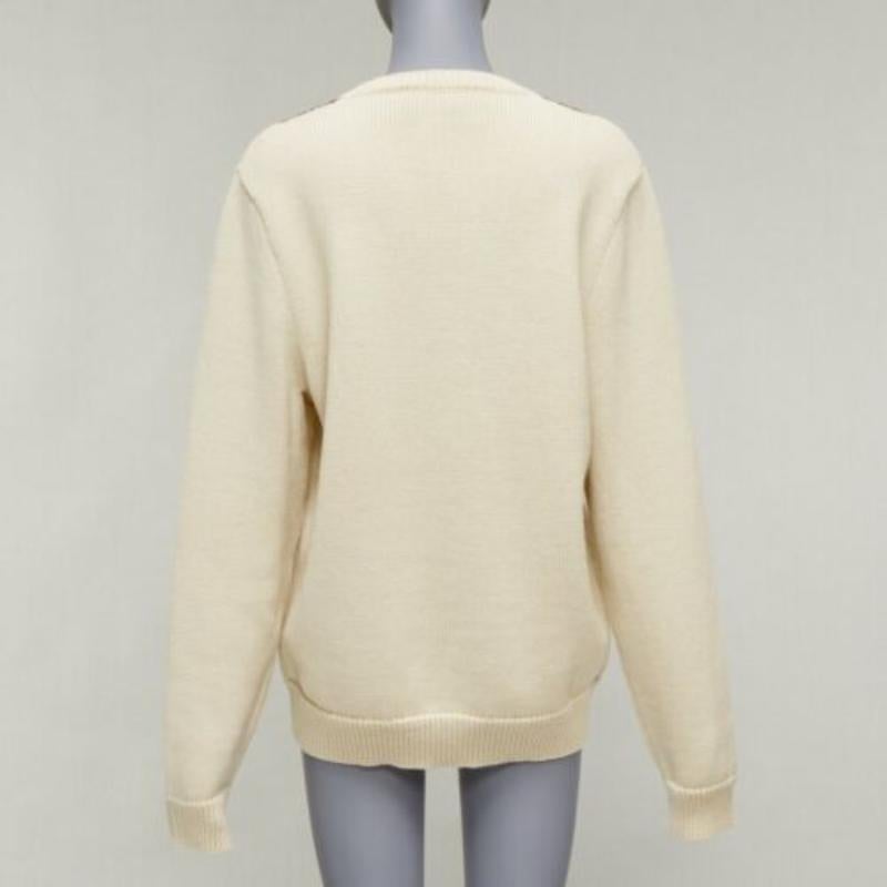 GUCCI 100% laine crème Pull Vintage GG monogramme col V Varsity S Pour femmes en vente
