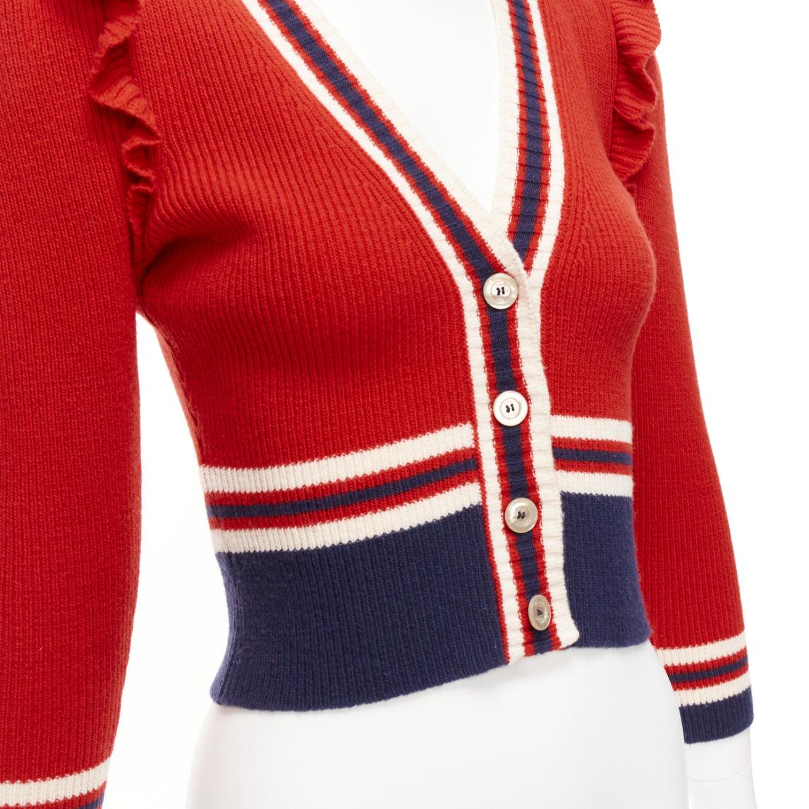GUCCI 100% wool red navy ruffle trim ribbed hem cropped cardigan XS
Reference: EALU/A00012
Brand: Gucci
Designer: Alessandro Michele
Material: Wool
Color: Red, Navy
Pattern: Striped
Closure: Button
Extra Details: Striped ribs at collar and hem at