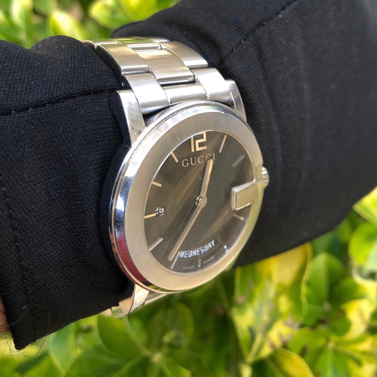 gucci black face watch