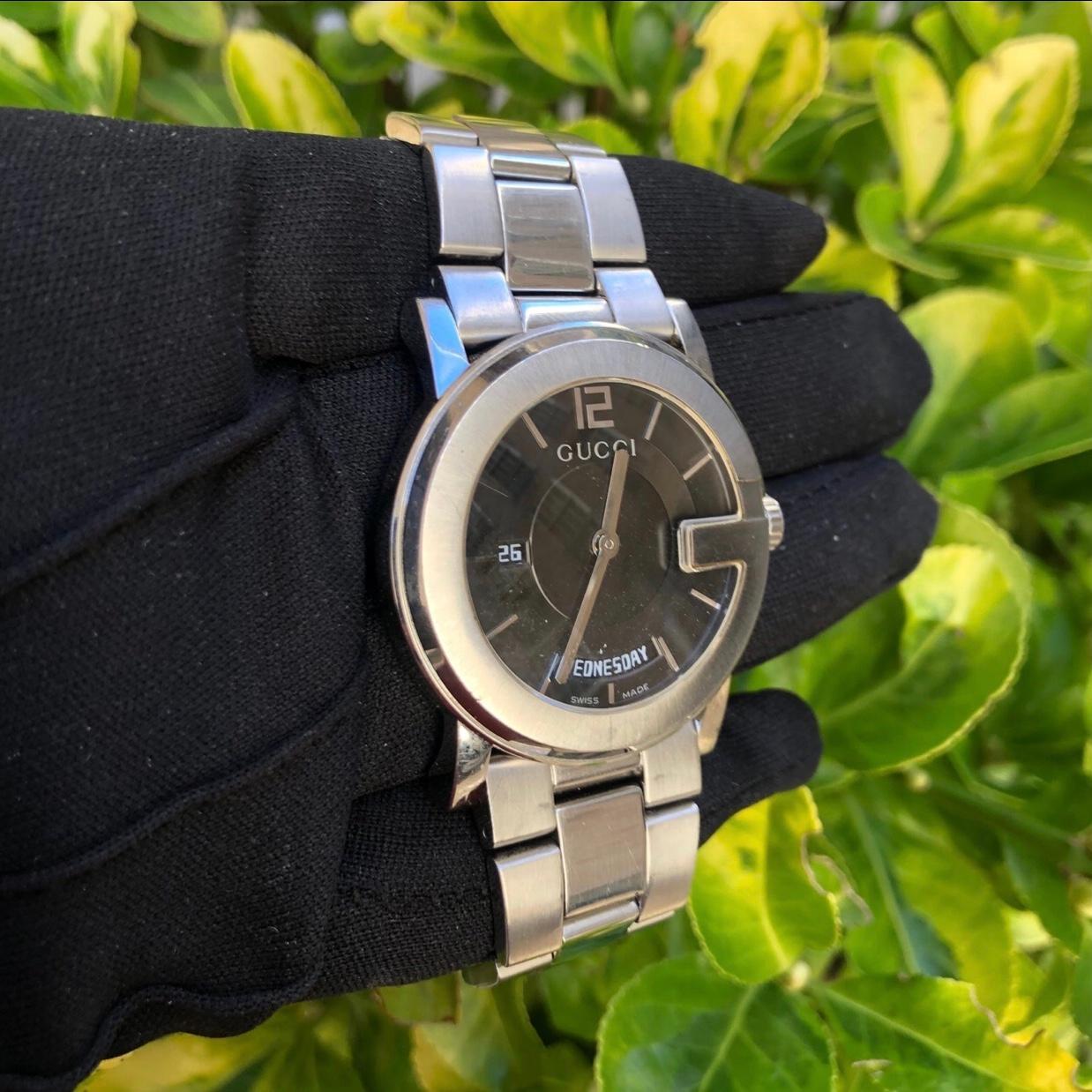 black face gucci watch