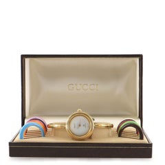 Gucci 1100 Interchangeable Bezel Bangle Quartz Watch Plated Metal with Plastic