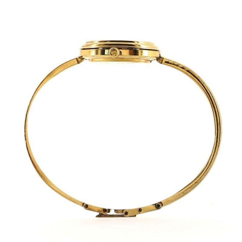 Gucci 1100 Interchangeable Bezel Bangle Quartz Watch Plated Metal with Plastic In Fair Condition In New York, NY