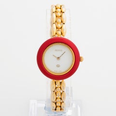 Reloj de pulsera Gucci 11.12 bisel intercambiable para mujer. Chapado en oro. Pulsera de 170 mm