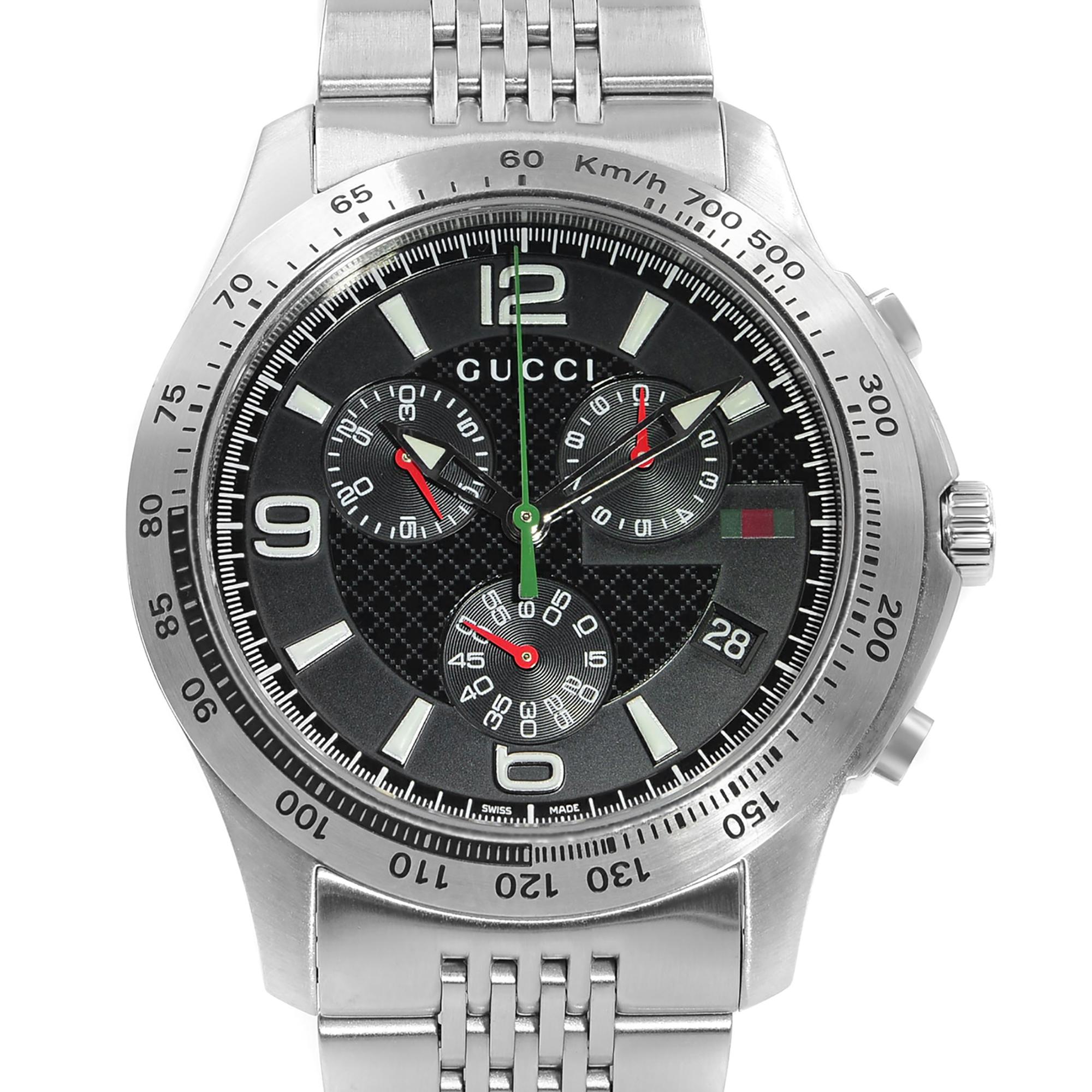 This display model Gucci 126 YA126221  is a beautiful men's timepiece that is powered by quartz (battery) movement which is cased in a stainless steel case. It has a round shape face, chronograph, date indicator, small seconds subdial, tachymeter