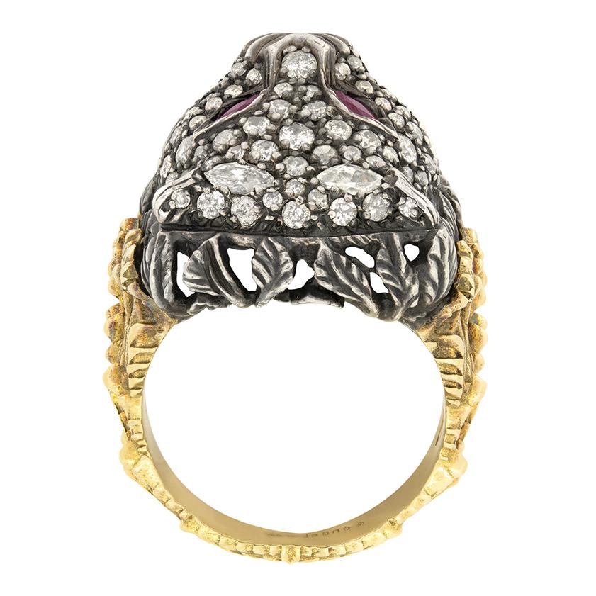 This striking creation comes from Gucci's 'Le Marché des Merveilles' collection. Featuring a bold tigers head design, this ring is a true statement piece. The tiger head centre piece, sculpted in silver, is adorned 1.50 carats of round brilliant and