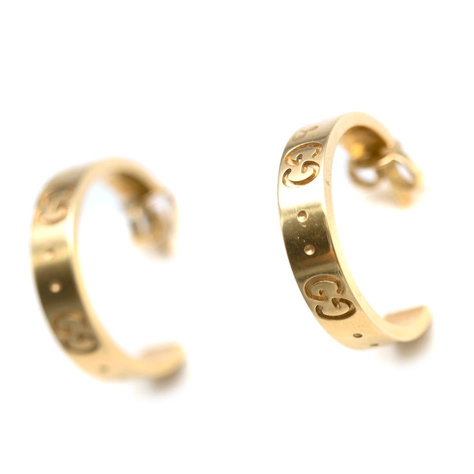Gucci Icon 18ct Gold half-loop earrings

- Engraved with the iconic 'Double G' logo
- Made in Italy

Please note, these items are pre-owned and may show some signs of storage, even when unworn and unused. This is reflected within the significantly