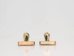 Gemelos de barra de oro de 18 quilates Gucci