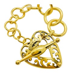Vintage Gucci 18 Karat Gold Link Bracelet with Toggle Clasp & Heart Shaped Center Piece