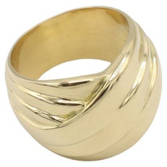 Gucci Anello a fascia larga incrociata in oro giallo 18 carati