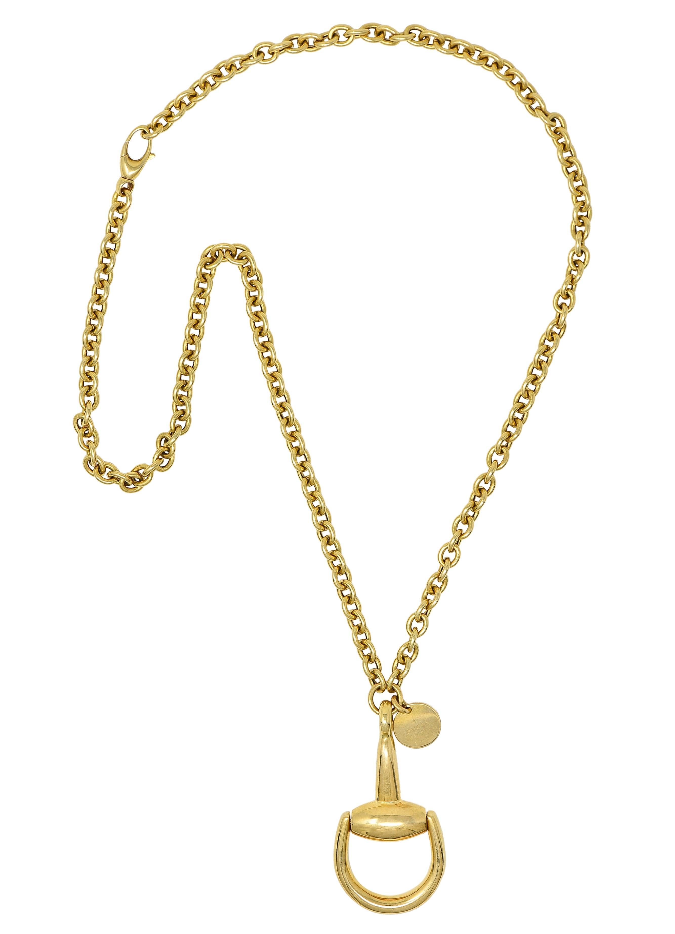 Necklace is designed as a cable chain suspending a substantial horsebit motif pendant
High polish with articulating looped bit
Stamped 750 with Italian assay marks for 18 karat gold
With logo tag fully signed Gucci, Made in Italy
Circa: 1990's, from