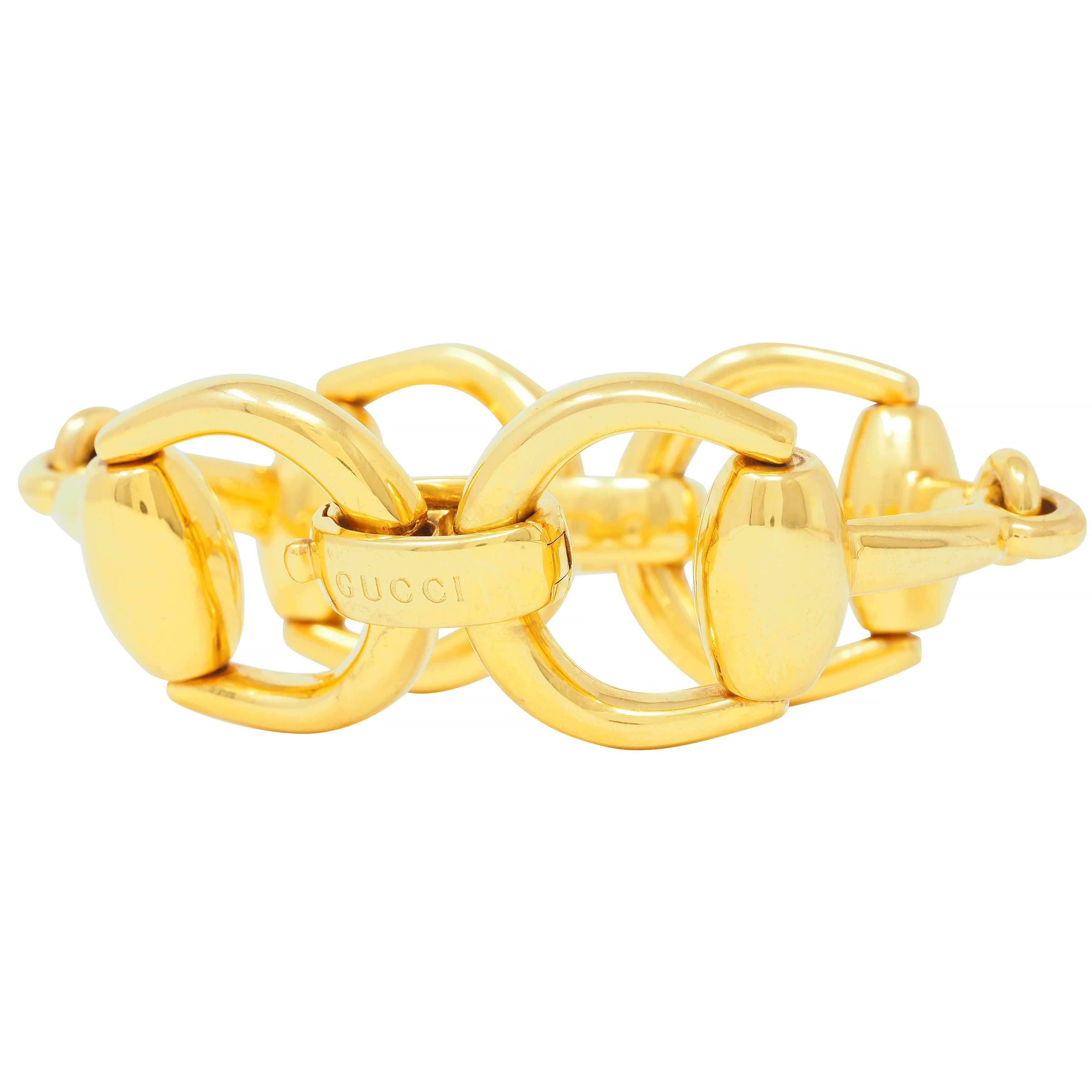 Bracelet is designed as large horsebit motif links
Connected via large oval shaped links
With high polished gold finish
Terminating horse-bit is hinged as clasp closure
Stamped 750 with Italian assay marks for 18 karat gold
Fully signed Gucci, Made
