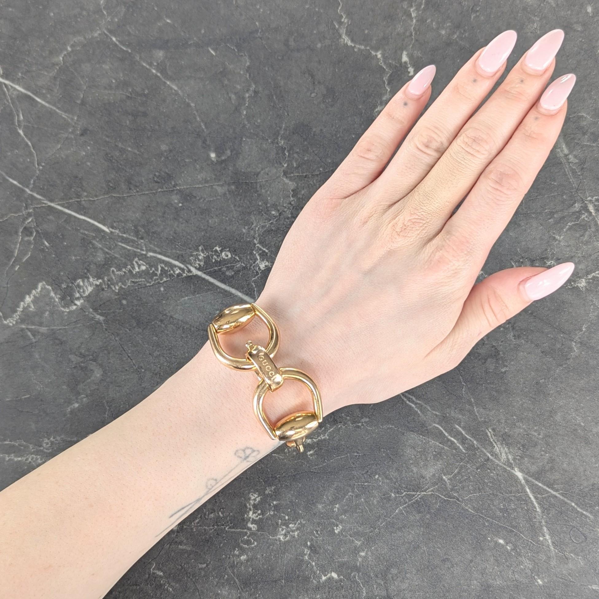 Bracelet is designed as large horsebit motif links
Connected via large oval shaped links
With high polished gold finish
Terminating horse-bit is hinged as clasp closure
Stamped 750 with Italian assay marks for 18 karat gold
Fully signed Gucci, Made