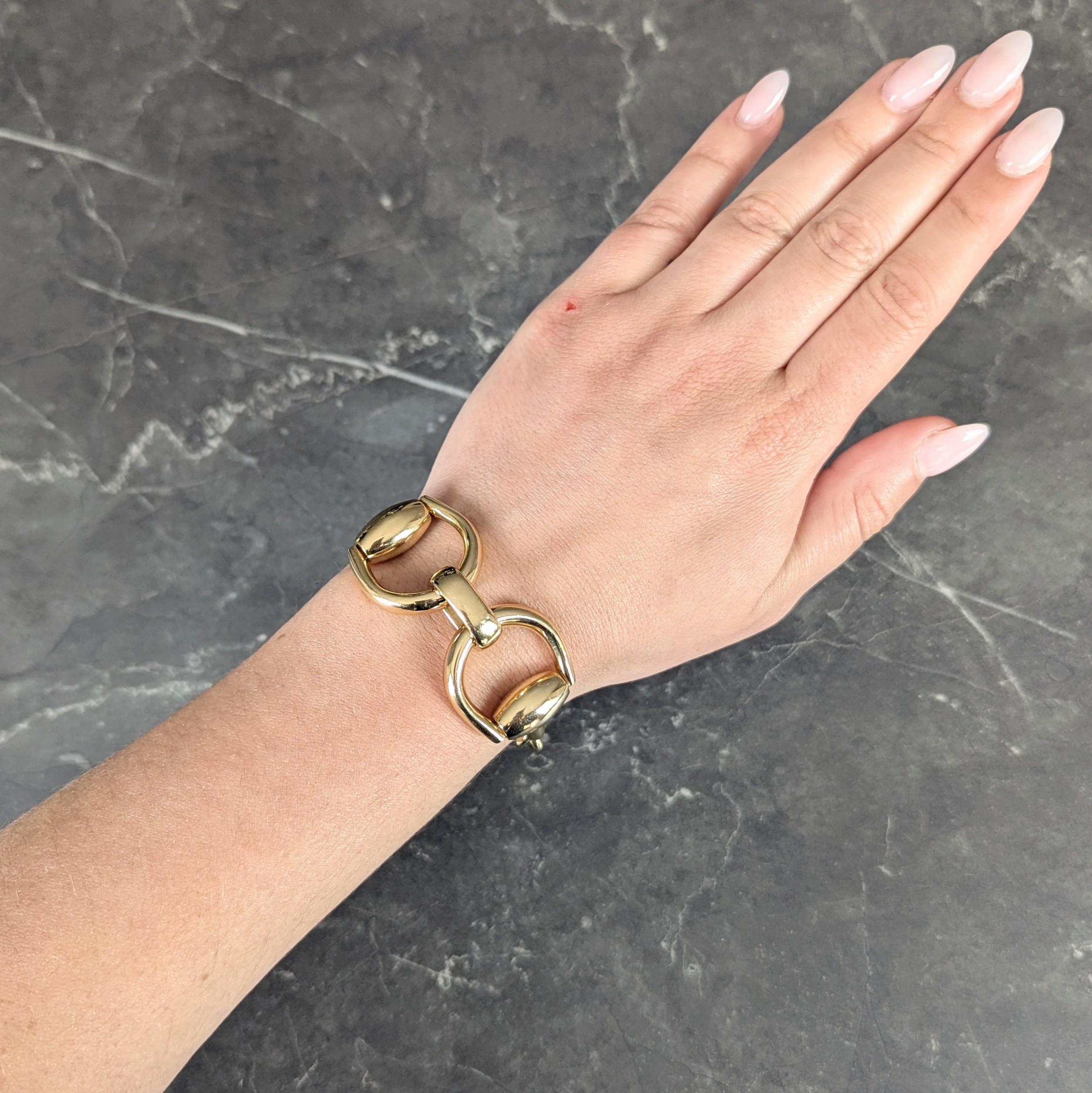 Bracelet is designed as large horsebit motif links
Connected via large oval shaped links
With high polished gold finish
Terminating horse-bit is hinged as clasp closure
Stamped 750 with Italian assay marks for 18 karat gold
Fully signed Gucci, Made