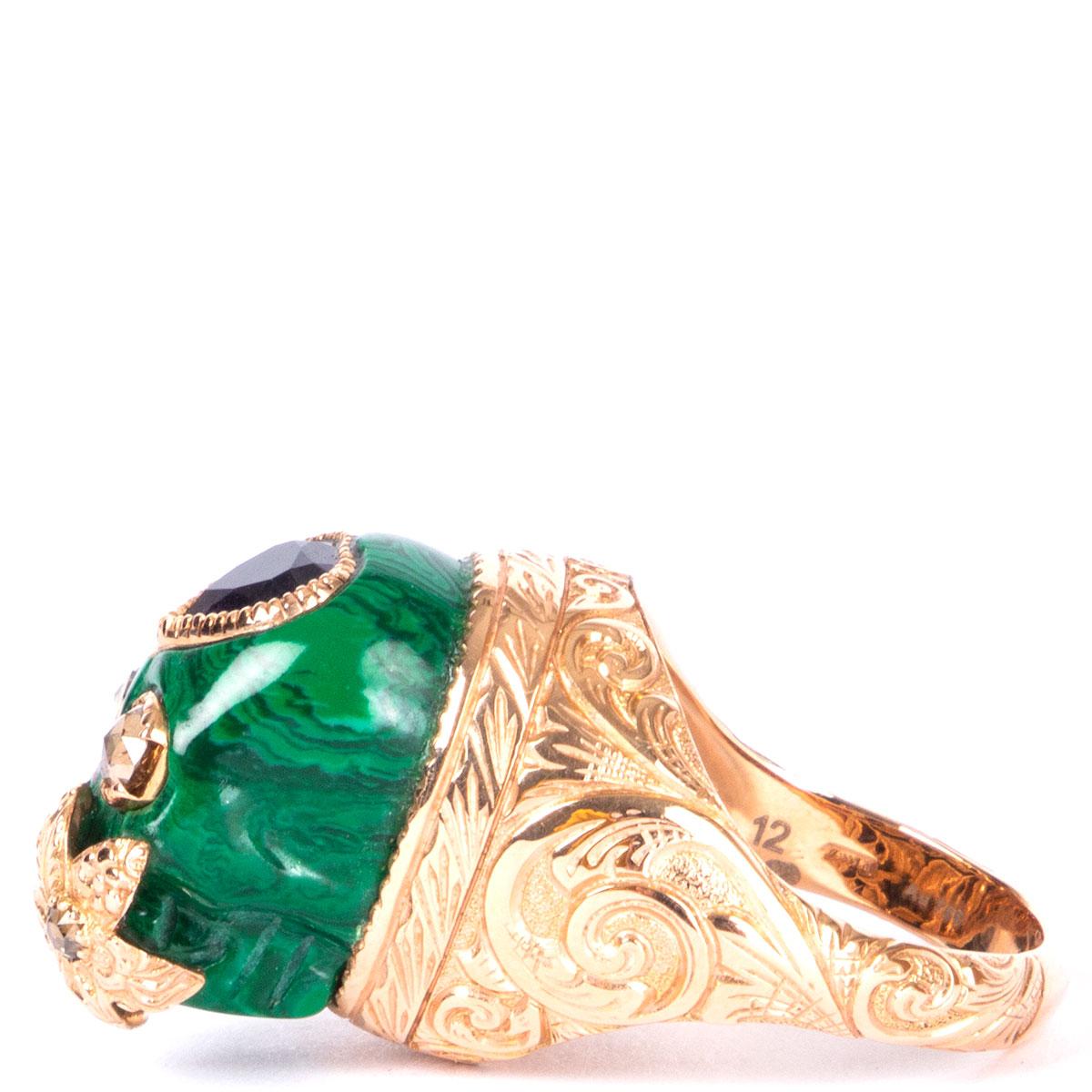 100% authentic Gucci skull ring in 18ct rose gold with synthetic malachite, sapphire and diamonds. Has been worn and is in excellent condition.

Size 6
Depth 3cm (1.2in)
Length 2cm (0.8in)
Hardware 18ct Rose Gold

All our listings include only the