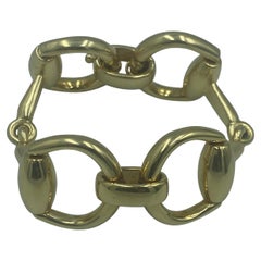 Gucci 18k gold stirrup link bracelet