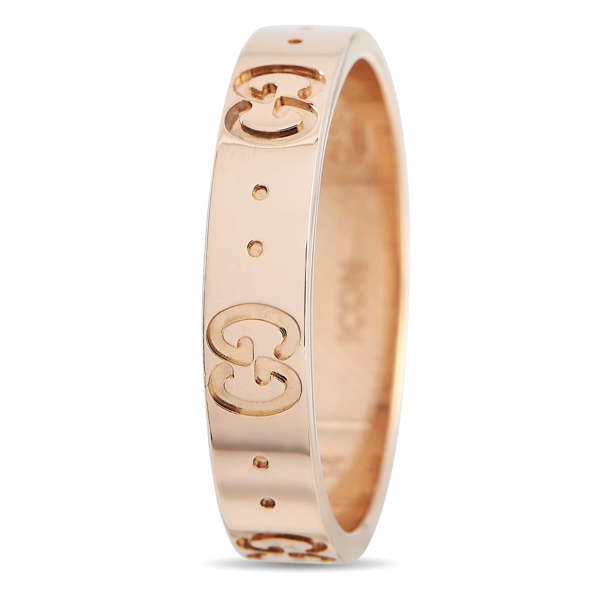 The iconic Double G logo takes center stage on this sleek Gucci band ring. Crafted from 18K Rose Gold, this understated accessory measures 4mm wide and will instantly add a touch of luxury to any outfit.This jewelry piece is offered in estate