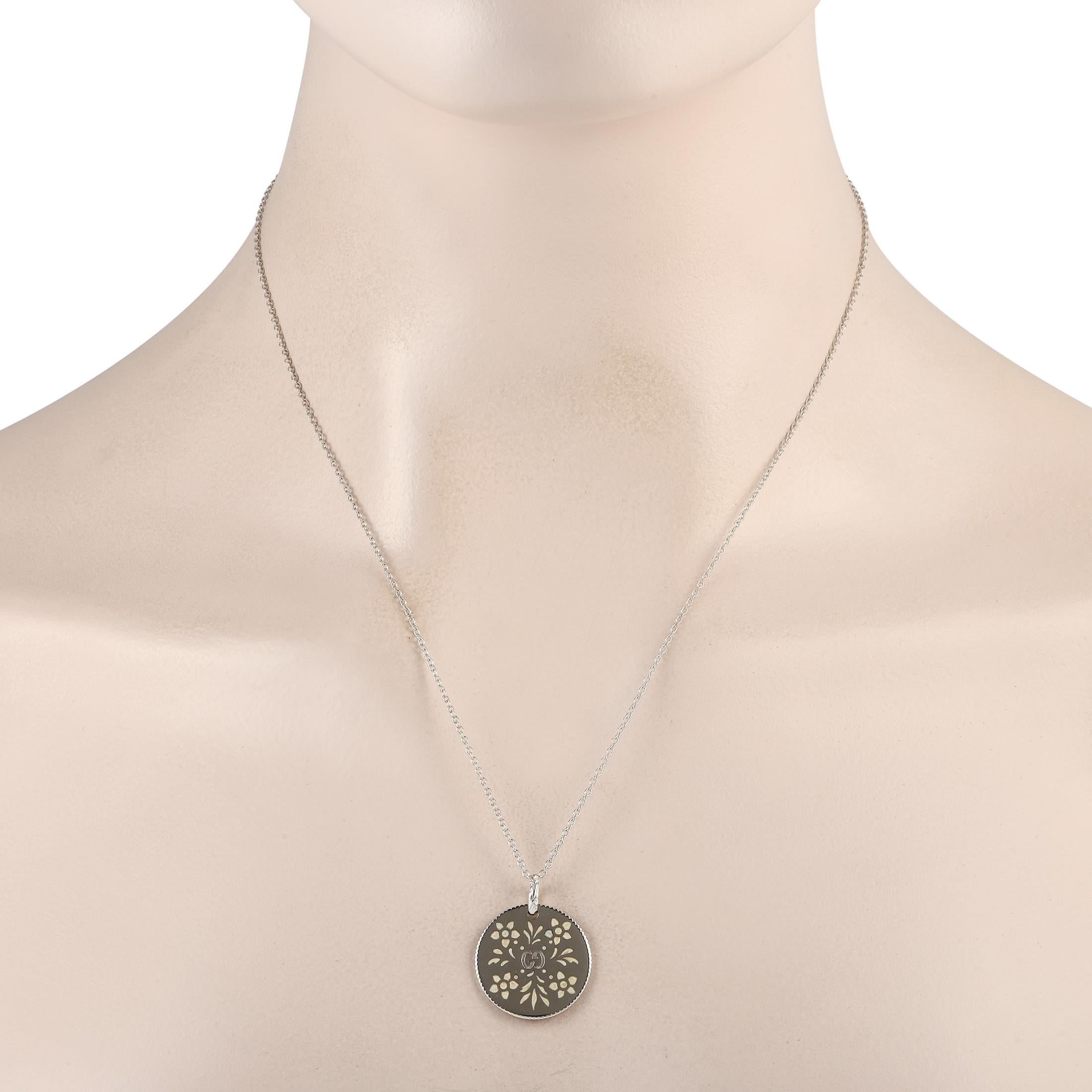 Make a stunning statement by adding this luxurious Gucci necklace to any ensemble. Suspended from a 20.0 chain, youll find an 18K White Gold pendant measuring 1.0 long by 0.80 wide. The iconic Gucci logo engraved at the center offers a fabulous