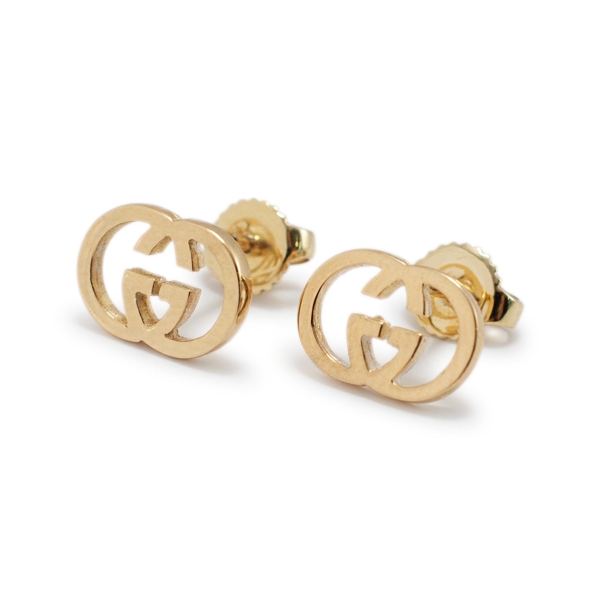Brand: Gucci 

Gender: Ladies

Metal Type: 18K Yellow Gold

Length: 0.50 inches

Width: 10.90 mm

Weight: 2.32 grams

One pair of ladies 18K yellow gold stud earrings with pushbacks. The metal was tested and determined to be 18K yellow gold.