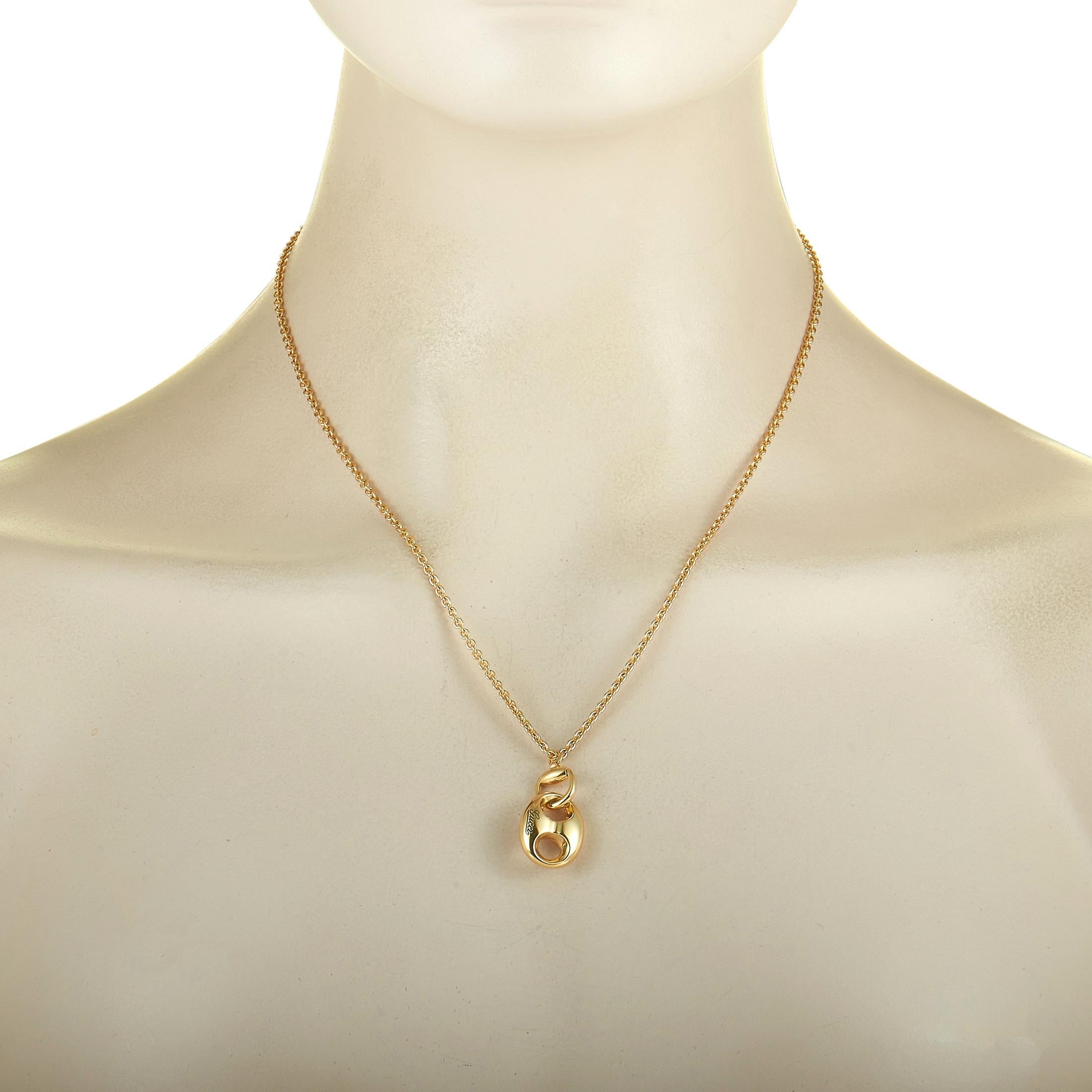 This Gucci necklace is crafted from 18K yellow gold and weighs 13 grams. It boasts an 18” chain and a pendant that measures 1” in length and 0.60” in width.
 
 The necklace is offered in brand new condition and includes the manufacturer’s box and