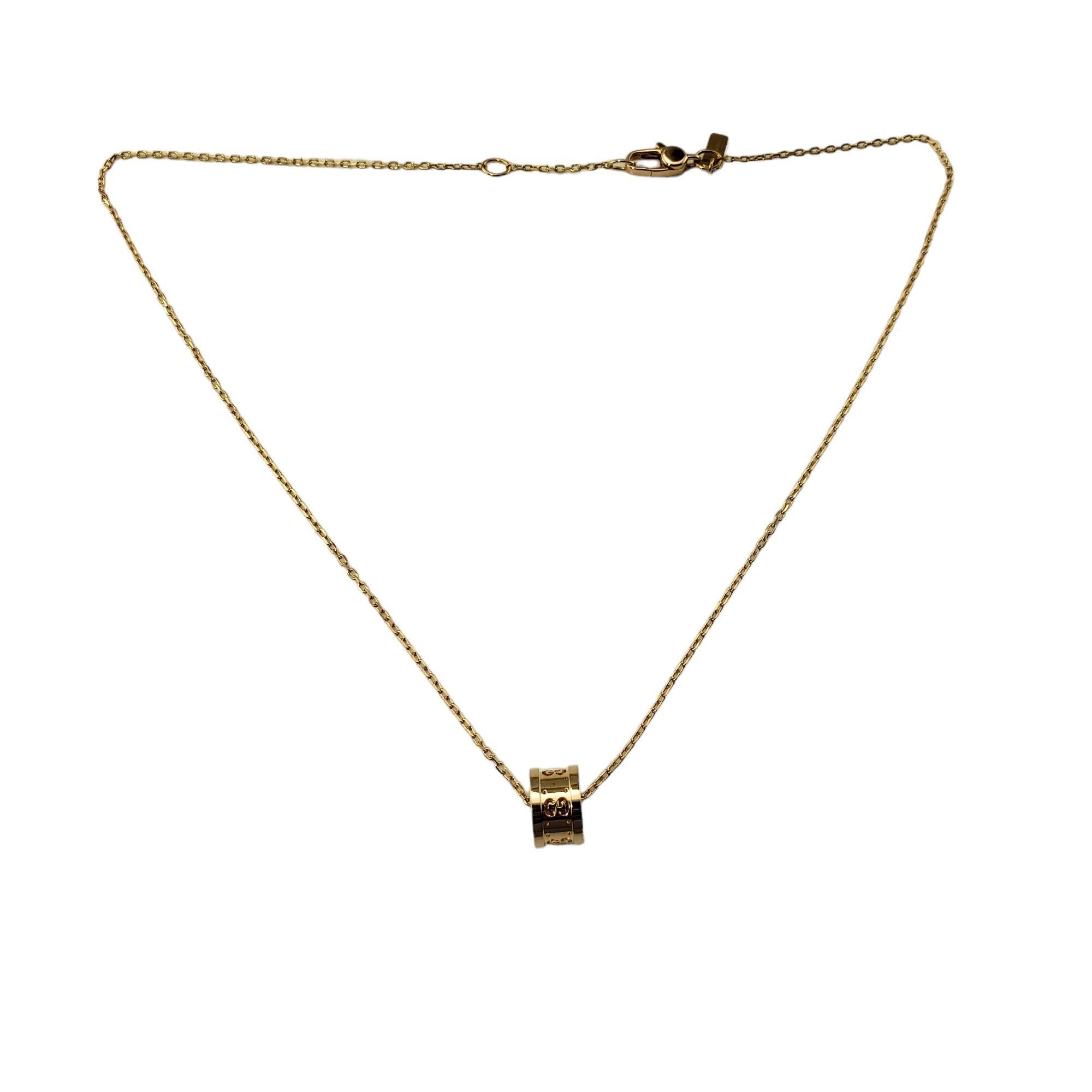 Gucci 18K Yellow Gold Icon Twirl Pendant Necklace-

This elegant Gucci piece features a signature GG barrel pendant suspended from a polished 18K yellow gold necklace.

Size:  16.5 mm (necklace)
          10 mm x 10 mm (pendant)

Hallmark:  Gucci 