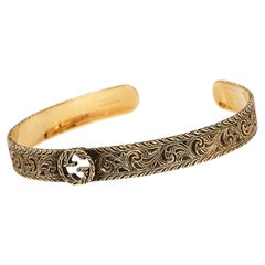 Gucci 18K Yellow Gold Interlocking GG Engraved Cuff Bracelet