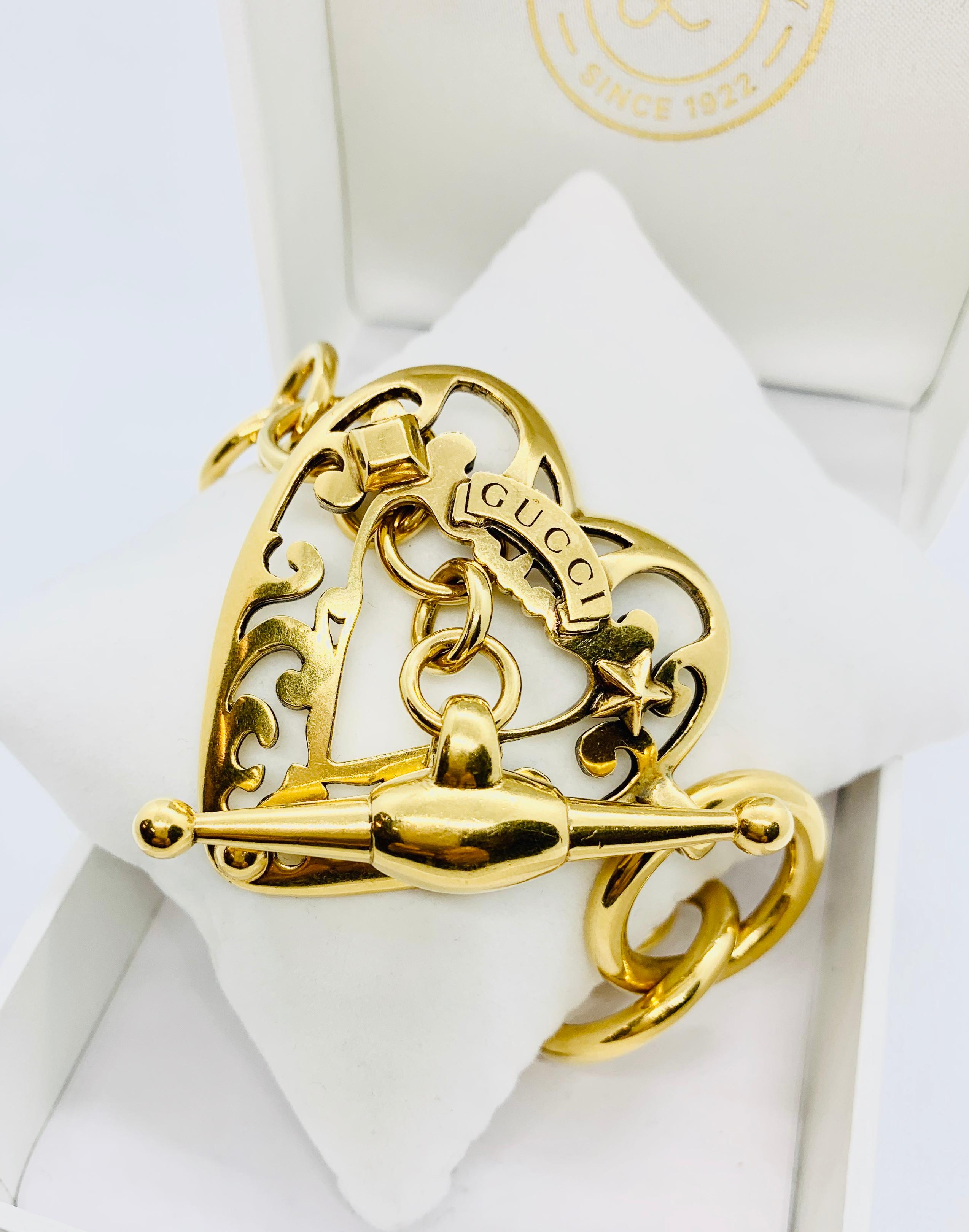 Gucci 18 Karat Gold Link Bracelet with Toggle Clasp & Heart Shaped Center Piece 2