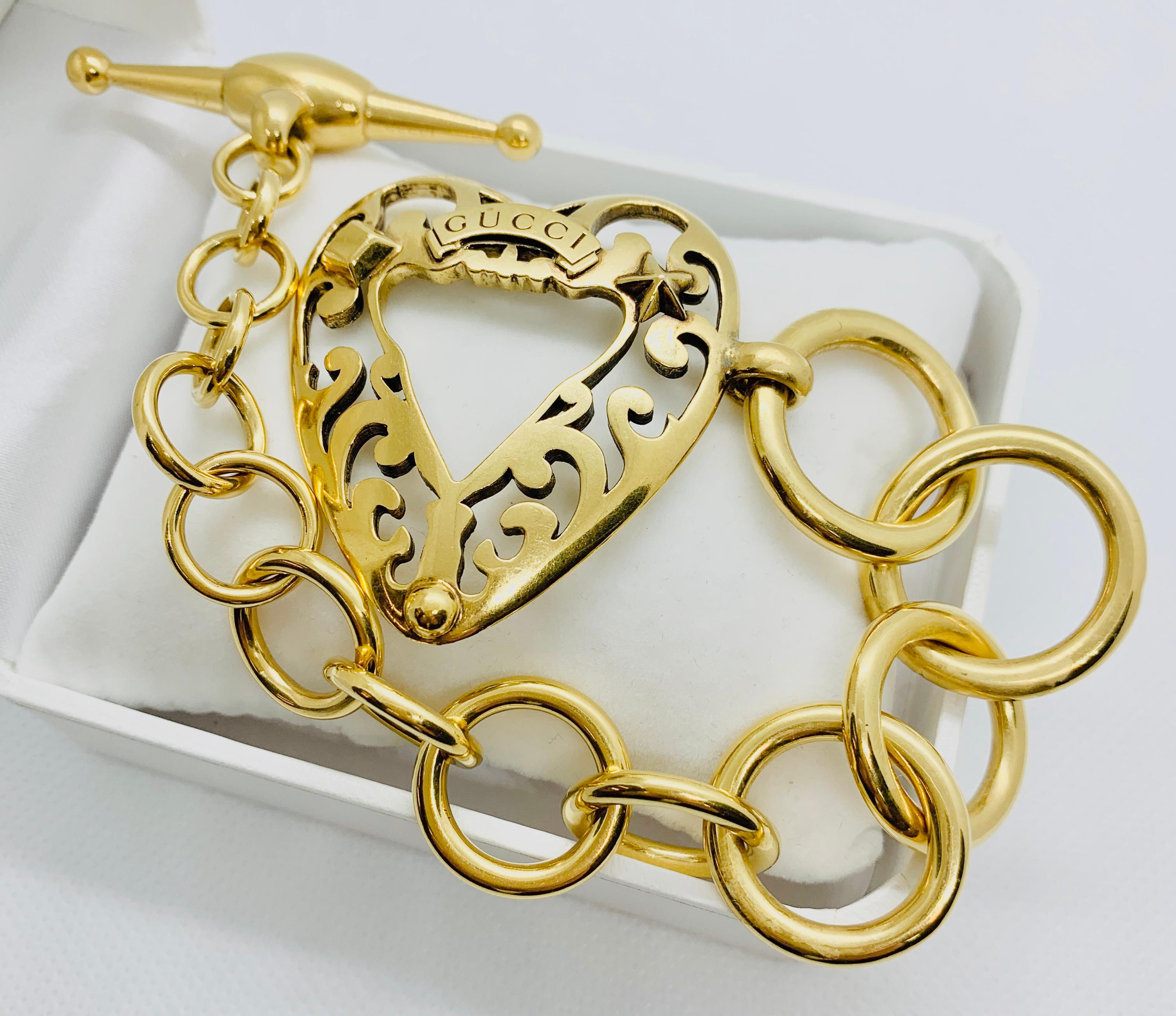 Gucci 18 Karat Gold Link Bracelet with Toggle Clasp & Heart Shaped Center Piece 7